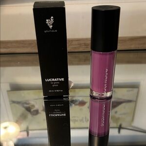 Younique Lucrative Lip Gloss - Bold Magenta